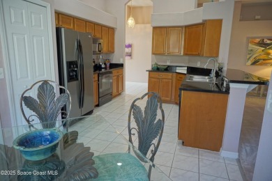 This 3 bedroom 2 bathroom home with high ceilings and relaxing on Majors Golf Club At Bayside Lakes in Florida - for sale on GolfHomes.com, golf home, golf lot