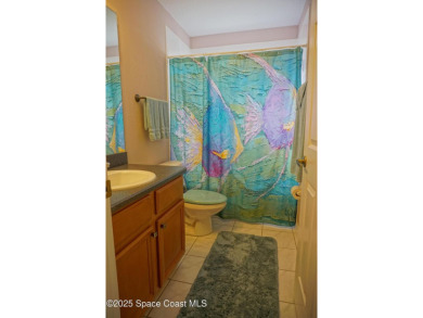 This 3 bedroom 2 bathroom home with high ceilings and relaxing on Majors Golf Club At Bayside Lakes in Florida - for sale on GolfHomes.com, golf home, golf lot