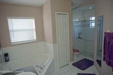 This 3 bedroom 2 bathroom home with high ceilings and relaxing on Majors Golf Club At Bayside Lakes in Florida - for sale on GolfHomes.com, golf home, golf lot