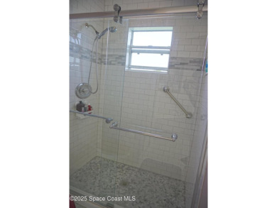 This 3 bedroom 2 bathroom home with high ceilings and relaxing on Majors Golf Club At Bayside Lakes in Florida - for sale on GolfHomes.com, golf home, golf lot