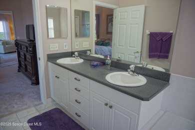 This 3 bedroom 2 bathroom home with high ceilings and relaxing on Majors Golf Club At Bayside Lakes in Florida - for sale on GolfHomes.com, golf home, golf lot