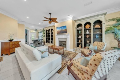 Experience coastal luxury at Sunshine Retreat nestled in the on Regatta Bay Golf and Country Club in Florida - for sale on GolfHomes.com, golf home, golf lot