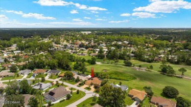 Charming 3-Bed, 2-Bath Pool Home on the Golf Course! This on The Grand Club - Pine Lakes Course in Florida - for sale on GolfHomes.com, golf home, golf lot