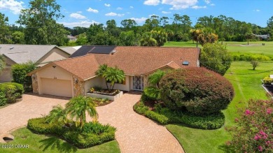Charming 3-Bed, 2-Bath Pool Home on the Golf Course! This on The Grand Club - Pine Lakes Course in Florida - for sale on GolfHomes.com, golf home, golf lot