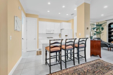 Experience coastal luxury at Sunshine Retreat nestled in the on Regatta Bay Golf and Country Club in Florida - for sale on GolfHomes.com, golf home, golf lot