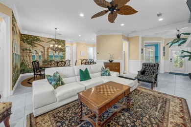 Experience coastal luxury at Sunshine Retreat nestled in the on Regatta Bay Golf and Country Club in Florida - for sale on GolfHomes.com, golf home, golf lot