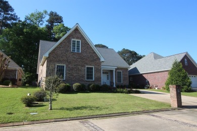 Welcome to your dream home in the charming town of Laurel on Laurel Country Club in Mississippi - for sale on GolfHomes.com, golf home, golf lot