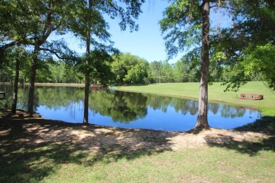 Welcome to your dream home in the charming town of Laurel on Laurel Country Club in Mississippi - for sale on GolfHomes.com, golf home, golf lot