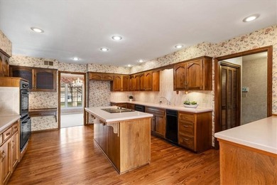 Nestled along the 16th hole at the Country Club of Leawood, this on Leawood South Country Club in Kansas - for sale on GolfHomes.com, golf home, golf lot