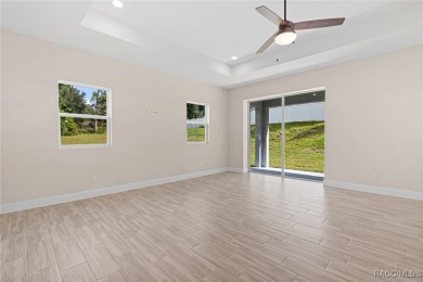 Enjoy the difference that award-winning quality makes in this on Citrus Springs Country Club in Florida - for sale on GolfHomes.com, golf home, golf lot