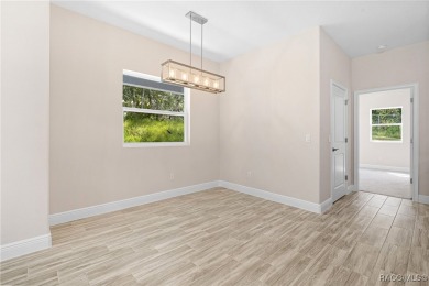 Enjoy the difference that award-winning quality makes in this on Citrus Springs Country Club in Florida - for sale on GolfHomes.com, golf home, golf lot