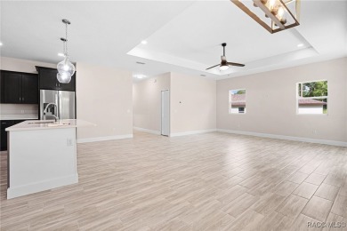 Enjoy the difference that award-winning quality makes in this on Citrus Springs Country Club in Florida - for sale on GolfHomes.com, golf home, golf lot