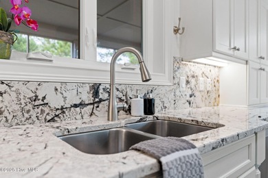 Refined coastal living in the resort-style and vibrant community on Members Club At St. James Plantation in North Carolina - for sale on GolfHomes.com, golf home, golf lot