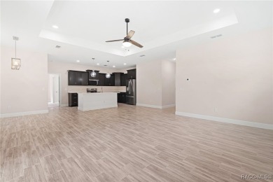 Enjoy the difference that award-winning quality makes in this on Citrus Springs Country Club in Florida - for sale on GolfHomes.com, golf home, golf lot