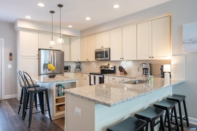 Live where you play in this stylish, low-maintenance townhome in on Old Trail Golf Club in Virginia - for sale on GolfHomes.com, golf home, golf lot