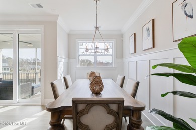 Luxury, views, and location -- this stunning end-unit elevator on Sea Trail Golf Resort in North Carolina - for sale on GolfHomes.com, golf home, golf lot