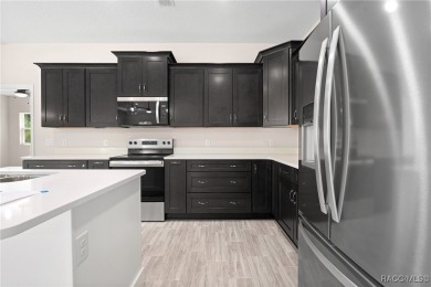 Enjoy the difference that award-winning quality makes in this on Citrus Springs Country Club in Florida - for sale on GolfHomes.com, golf home, golf lot