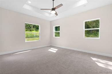 Enjoy the difference that award-winning quality makes in this on Citrus Springs Country Club in Florida - for sale on GolfHomes.com, golf home, golf lot