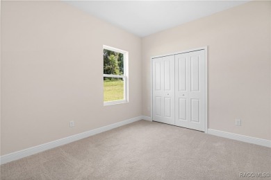 Enjoy the difference that award-winning quality makes in this on Citrus Springs Country Club in Florida - for sale on GolfHomes.com, golf home, golf lot