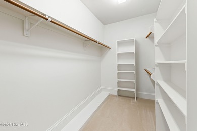 Refined coastal living in the resort-style and vibrant community on Members Club At St. James Plantation in North Carolina - for sale on GolfHomes.com, golf home, golf lot