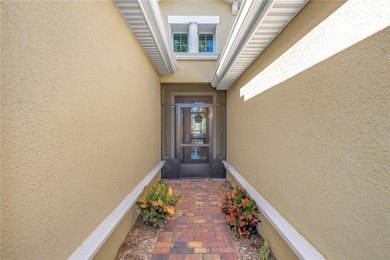 From the moment you step through the door, this MINTO Capistrano on Sandpiper Golf Club in Florida - for sale on GolfHomes.com, golf home, golf lot