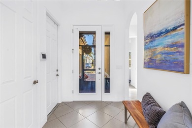 From the moment you step through the door, this MINTO Capistrano on Sandpiper Golf Club in Florida - for sale on GolfHomes.com, golf home, golf lot