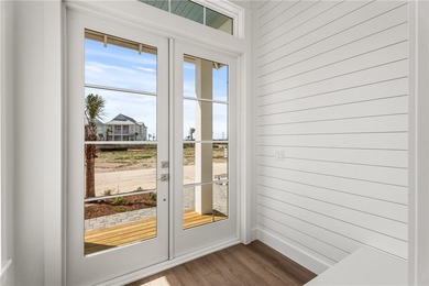 Welcome to 120 Lotus Lane, a beautifully designed two-story home on Palmilla Beach Golf Club in Texas - for sale on GolfHomes.com, golf home, golf lot