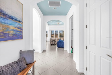 From the moment you step through the door, this MINTO Capistrano on Sandpiper Golf Club in Florida - for sale on GolfHomes.com, golf home, golf lot