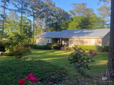 Welcome to this charming ranch-style home situated on a spacious on Vanity Fair Golf and Tennis Club in Alabama - for sale on GolfHomes.com, golf home, golf lot