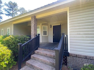 Welcome to this charming ranch-style home situated on a spacious on Vanity Fair Golf and Tennis Club in Alabama - for sale on GolfHomes.com, golf home, golf lot