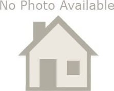 Welcome to this charming ranch-style home situated on a spacious on Vanity Fair Golf and Tennis Club in Alabama - for sale on GolfHomes.com, golf home, golf lot