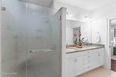 Refined coastal living in the resort-style and vibrant community on Members Club At St. James Plantation in North Carolina - for sale on GolfHomes.com, golf home, golf lot