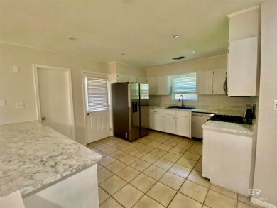 Welcome to this charming ranch-style home situated on a spacious on Vanity Fair Golf and Tennis Club in Alabama - for sale on GolfHomes.com, golf home, golf lot
