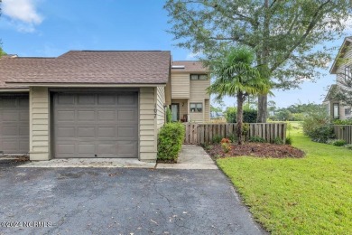 Beautifully updated and spacious END unit featuring a detached on Olde Point Golf and Country Club in North Carolina - for sale on GolfHomes.com, golf home, golf lot