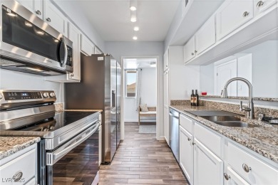 Meticulously maintained and beautifully remodeled second-story on Las Vegas Country Club in Nevada - for sale on GolfHomes.com, golf home, golf lot