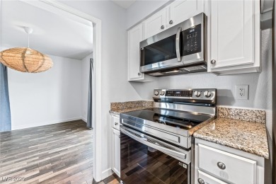 Meticulously maintained and beautifully remodeled second-story on Las Vegas Country Club in Nevada - for sale on GolfHomes.com, golf home, golf lot