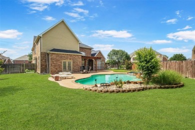 Welcome home to this expansive 6 bedroom, 3.5 bath home, with a on Mansfield National Golf Club in Texas - for sale on GolfHomes.com, golf home, golf lot