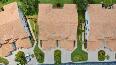 Stunning 2nd floor coach home in desirable Glen Eagle Golf on Glen Eagle Golf and Country Club in Florida - for sale on GolfHomes.com, golf home, golf lot