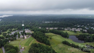 Explore this homesite to create your ideal home with your chosen on Tega Cay Golf Club in South Carolina - for sale on GolfHomes.com, golf home, golf lot