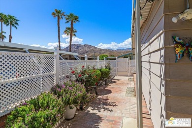 Enjoy gorgeous lakefront views from this coveted triple-wide on Date Palm Country Club in California - for sale on GolfHomes.com, golf home, golf lot