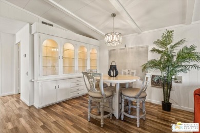 Enjoy gorgeous lakefront views from this coveted triple-wide on Date Palm Country Club in California - for sale on GolfHomes.com, golf home, golf lot