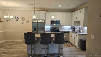 This luxury condo in Fairway Pointe in Anderson Creek Club is on Anderson Creek Golf Club in North Carolina - for sale on GolfHomes.com, golf home, golf lot