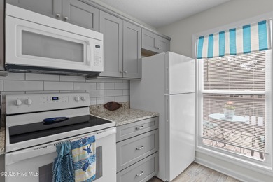 Welcome home to 7212 Windward Drive inside of the immaculate on Harbour Point Golf Club in North Carolina - for sale on GolfHomes.com, golf home, golf lot