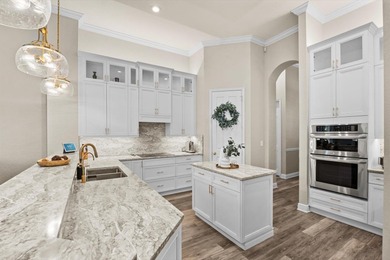 Experience luxury and privacy in this stunning home set on .67 on The Cape Club of Palm City in Florida - for sale on GolfHomes.com, golf home, golf lot