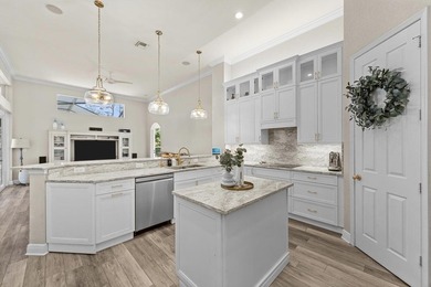 Experience luxury and privacy in this stunning home set on .67 on The Cape Club of Palm City in Florida - for sale on GolfHomes.com, golf home, golf lot