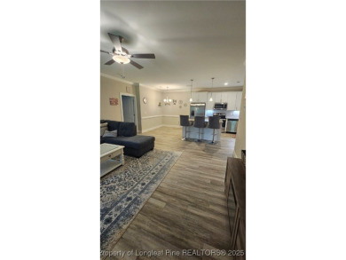 This luxury condo in Fairway Pointe in Anderson Creek Club is on Anderson Creek Golf Club in North Carolina - for sale on GolfHomes.com, golf home, golf lot