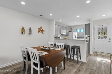 Welcome home to 7212 Windward Drive inside of the immaculate on Harbour Point Golf Club in North Carolina - for sale on GolfHomes.com, golf home, golf lot