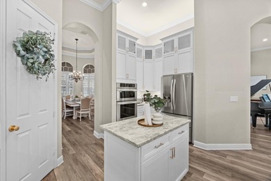 Experience luxury and privacy in this stunning home set on .67 on The Cape Club of Palm City in Florida - for sale on GolfHomes.com, golf home, golf lot