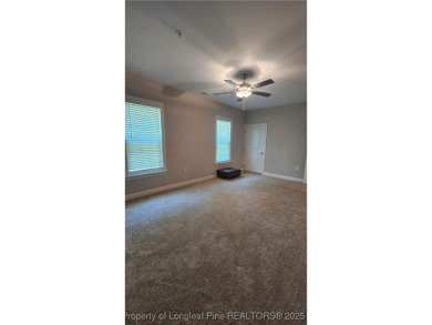 This luxury condo in Fairway Pointe in Anderson Creek Club is on Anderson Creek Golf Club in North Carolina - for sale on GolfHomes.com, golf home, golf lot