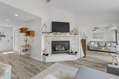 Welcome home to 7212 Windward Drive inside of the immaculate on Harbour Point Golf Club in North Carolina - for sale on GolfHomes.com, golf home, golf lot